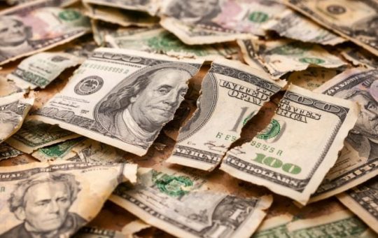 US dollar slides toward steepest weekly drop in seven months on policy uncertainty